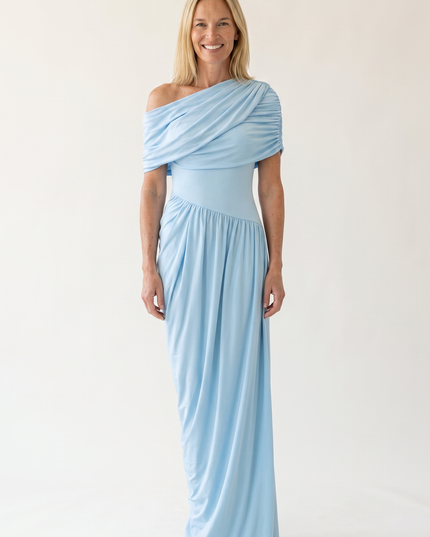 Woman wearing off shoulder maxi evening dress