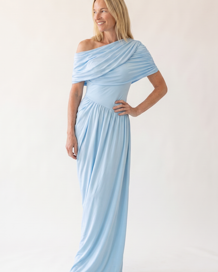 Woman wearing off shoulder maxi evening dress
