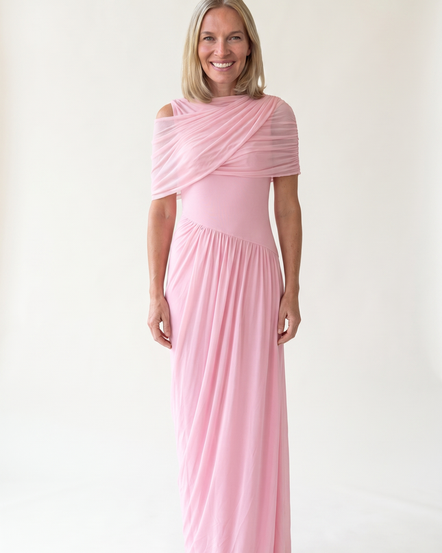 Woman wearing off shoulder maxi evening dress