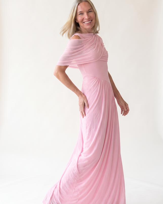 Woman wearing off shoulder maxi evening dress