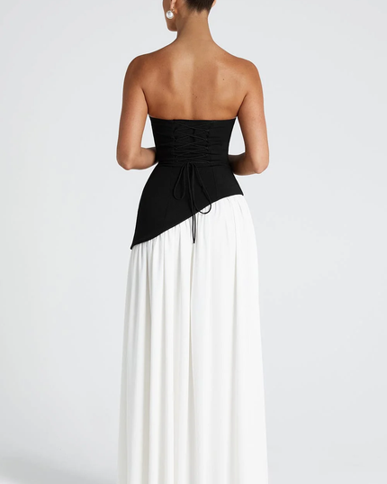 Woman wearing strapless split evening maxi dress