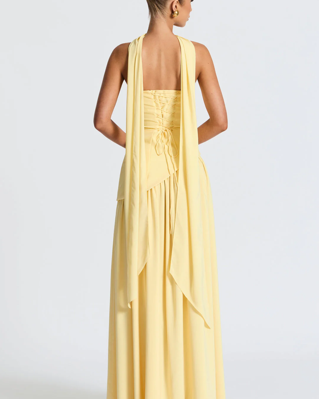 Woman wearing strapless split evening maxi dress