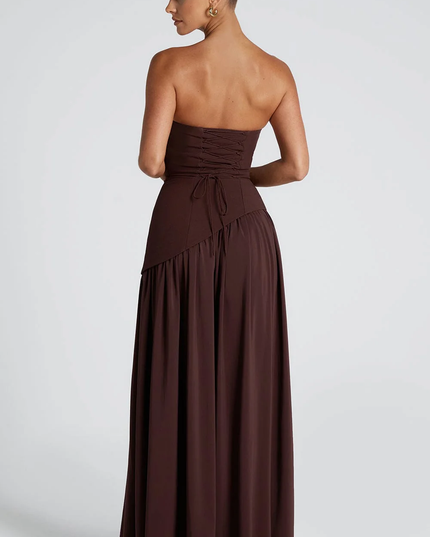 Woman wearing strapless split evening maxi dress