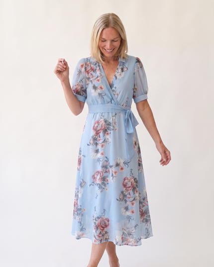 Woman wearing floral maxi wrap dress