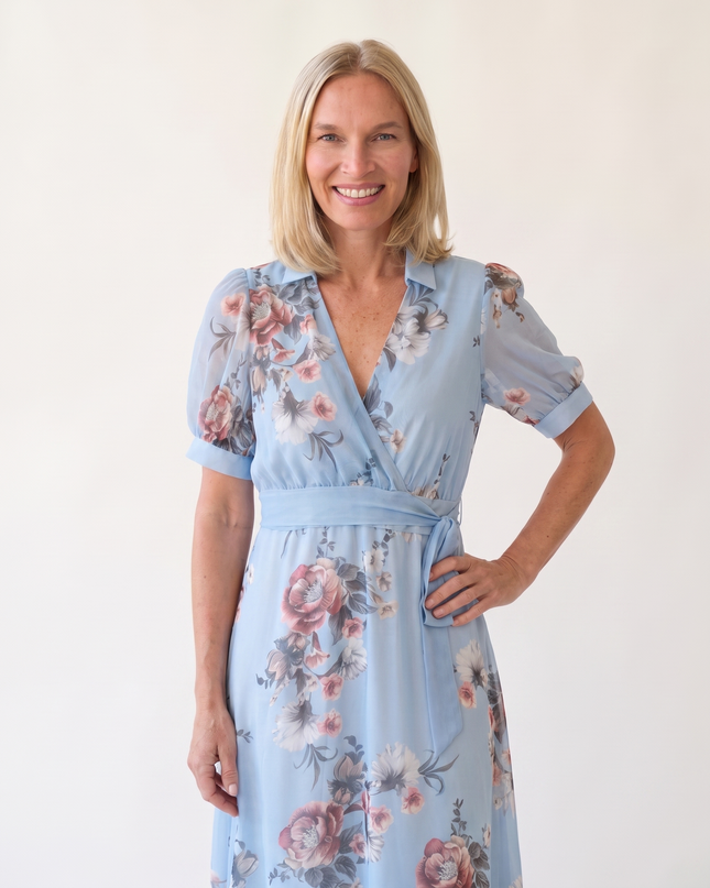 Woman wearing floral maxi wrap dress