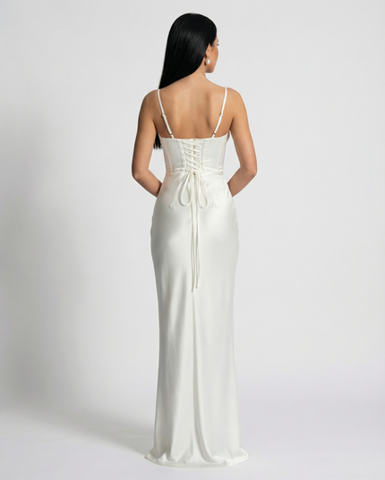 Woman wearing satin corset maxi dress