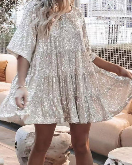 Woman wearing sequin oversized mini dress