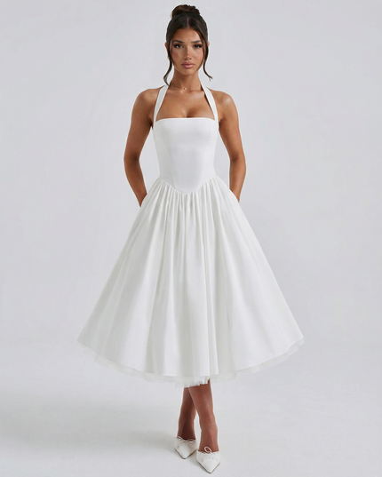 Woman wearing elegant white midi dress