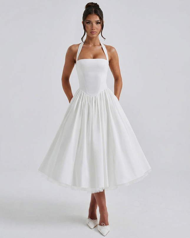 Woman wearing elegant white midi dress
