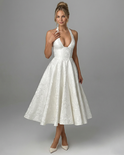 Woman wearing vintage halter midi dress