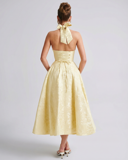 Woman wearing vintage halter midi dress