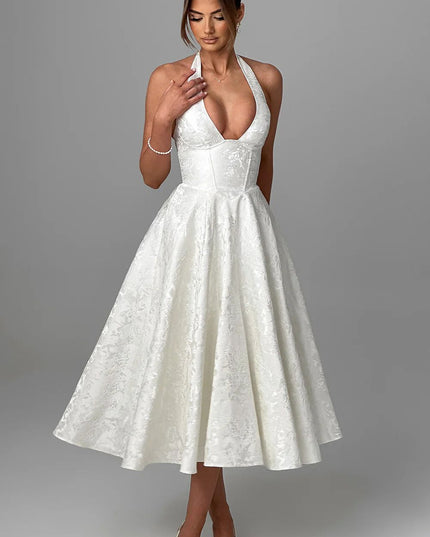 Woman wearing vintage halter midi dress