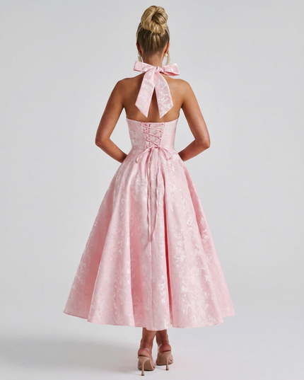 Woman wearing vintage halter midi dress