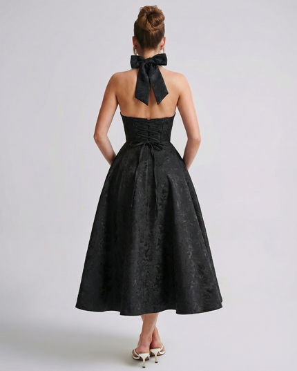 Woman wearing vintage halter midi dress