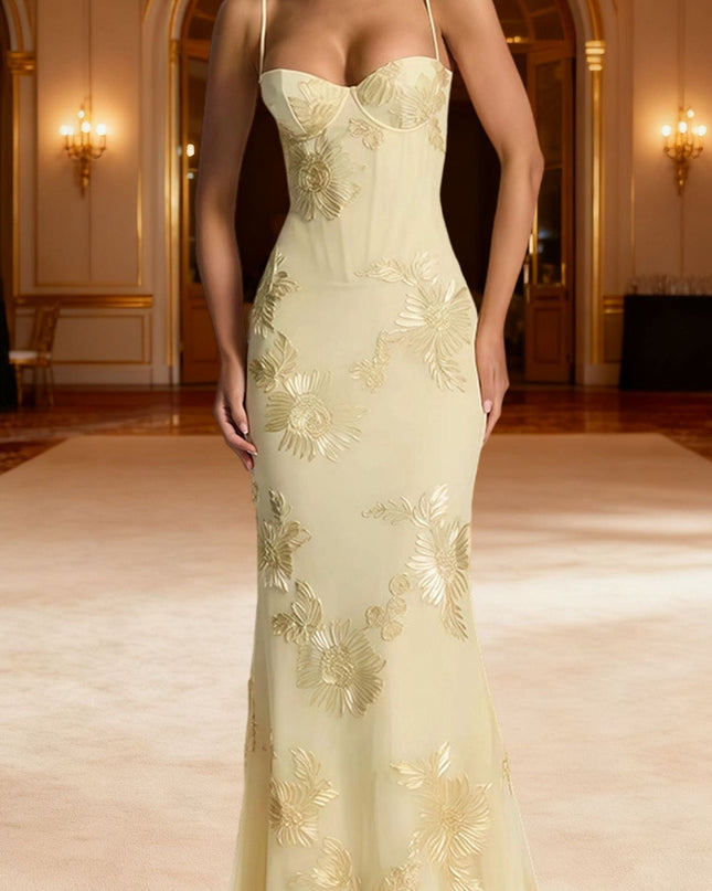 Woman wearing embroidered mermaid maxi dress