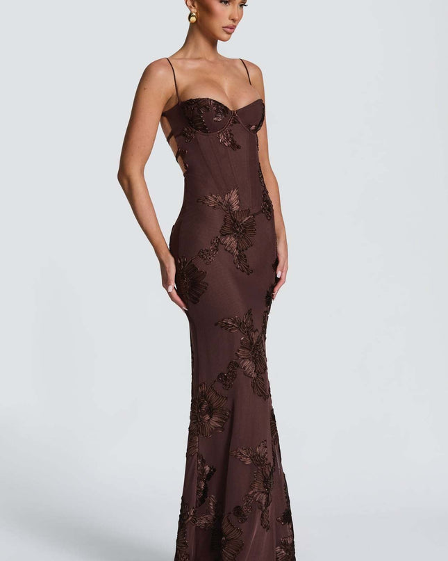Woman wearing embroidered mermaid maxi dress