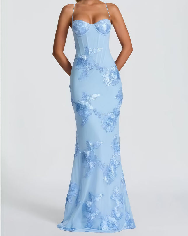 Woman wearing embroidered mermaid maxi dress