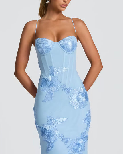 Woman wearing embroidered mermaid maxi dress
