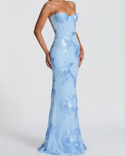 Woman wearing embroidered mermaid maxi dress