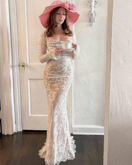 Woman wearing elegant lace maxi dress