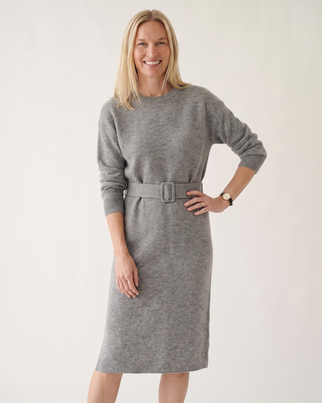 Woman wearing elegant knit midi dress