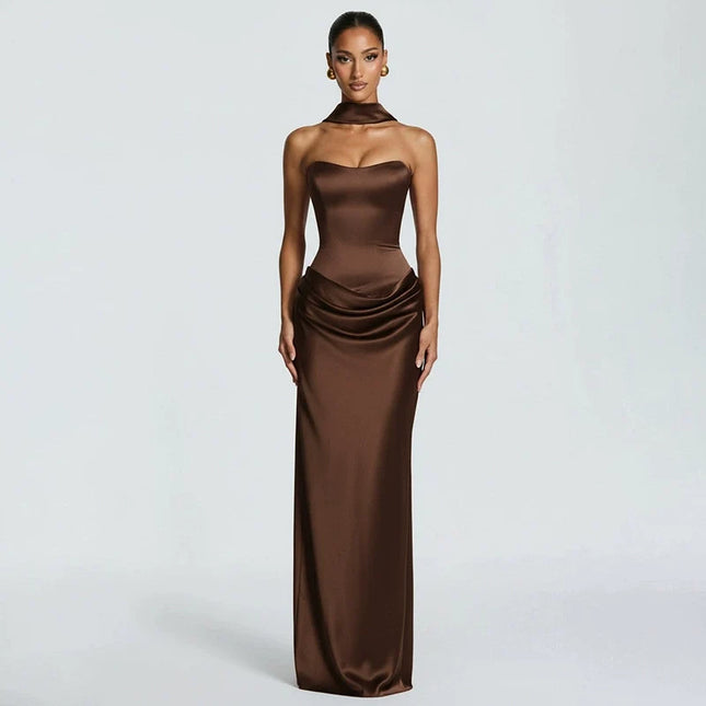 Woman wearing black satin corset maxi dress