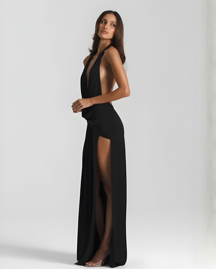 Woman wearing backless satin evening maxi dress