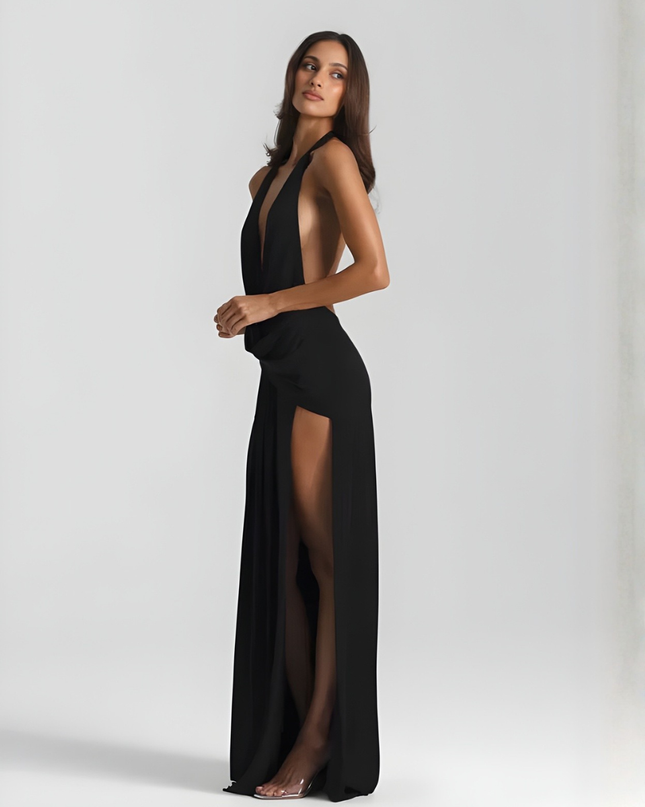 Woman wearing backless satin evening maxi dress