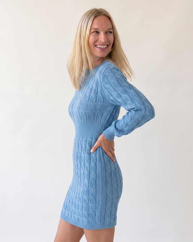Woman wearing elegant knit mini dress
