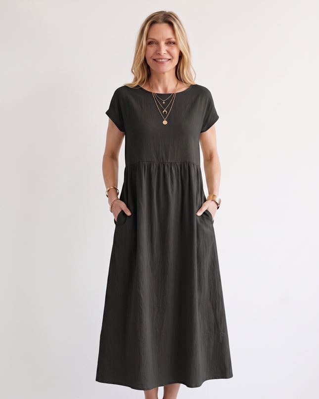 Woman wearing effortless linen midi dress