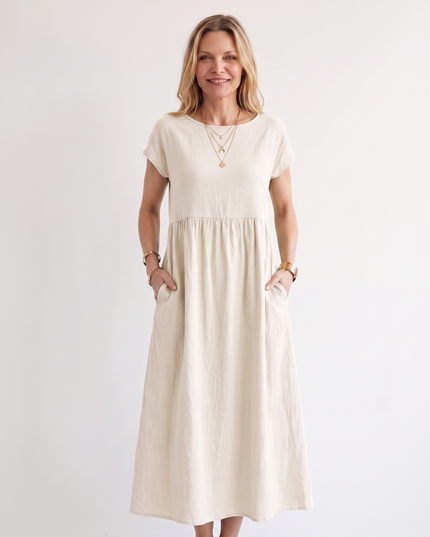Woman wearing effortless linen midi dress
