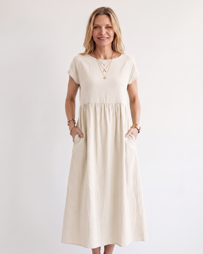 Woman wearing effortless linen midi dress