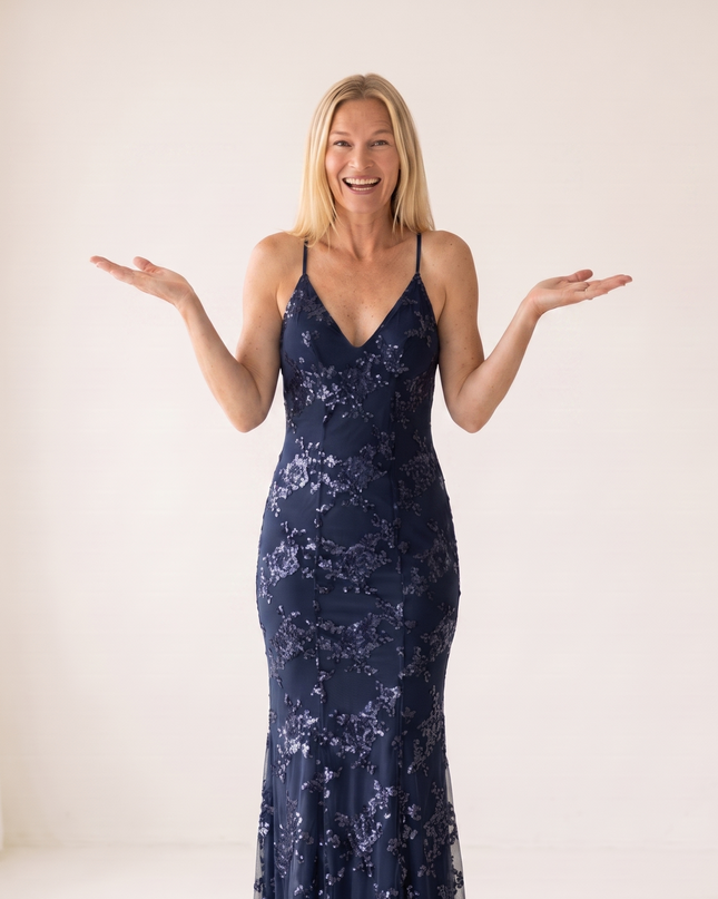 Woman wearing sequin mermaid maxi dress