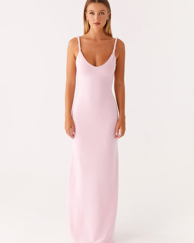 Woman wearing soft blue maxi dress
