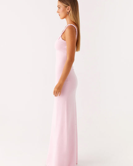 Woman wearing soft blue maxi dress