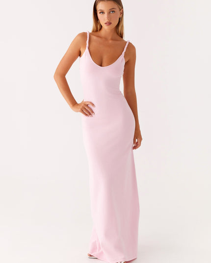 Woman wearing soft blue maxi dress