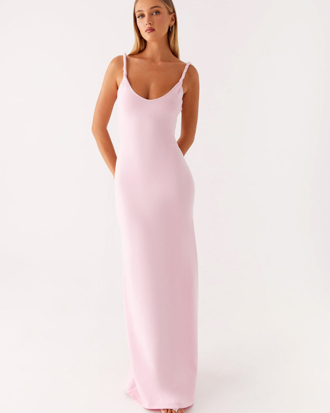 Woman wearing soft blue maxi dress