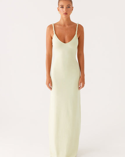 Woman wearing soft blue maxi dress