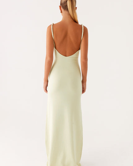 Woman wearing soft blue maxi dress