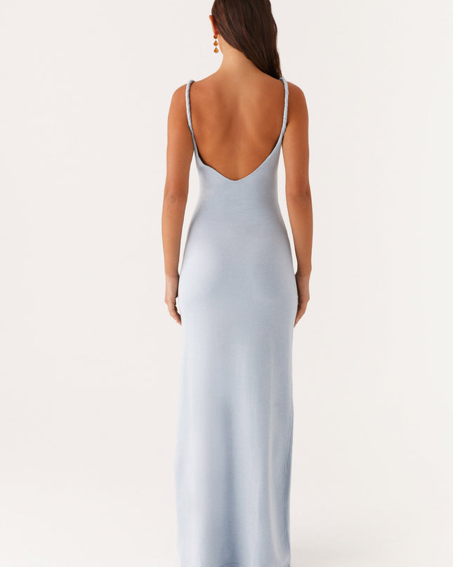 Woman wearing soft blue maxi dress