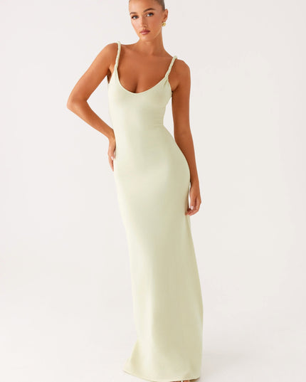 Woman wearing soft blue maxi dress