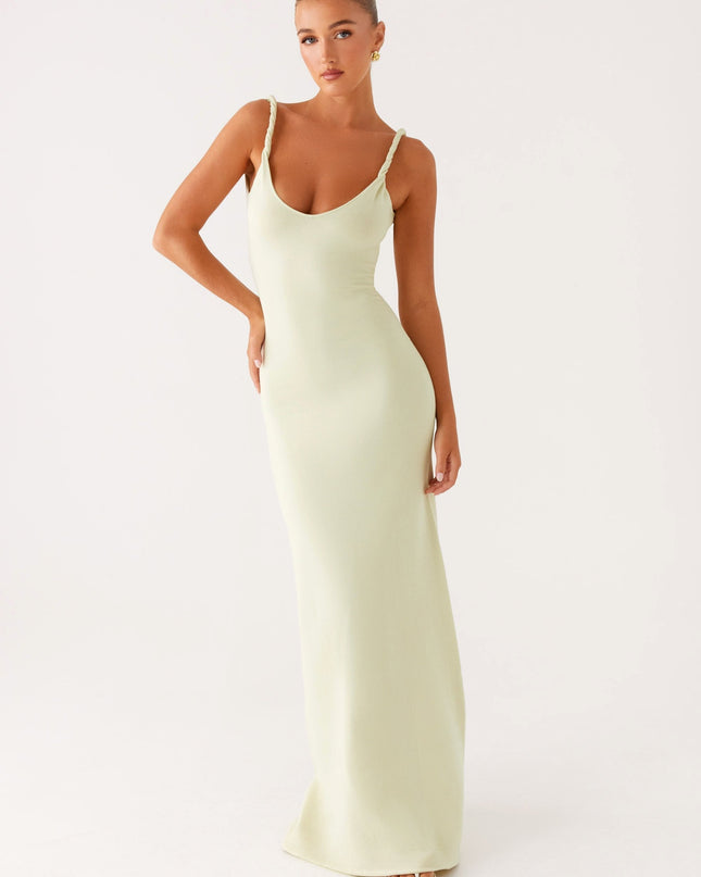 Woman wearing soft blue maxi dress