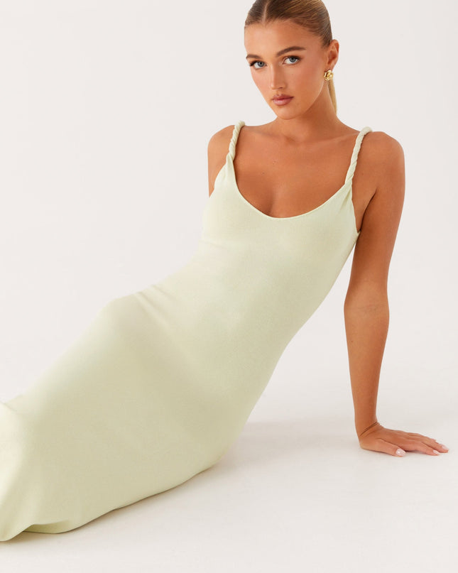 Woman wearing soft blue maxi dress
