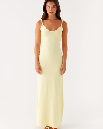 Woman wearing soft blue maxi dress