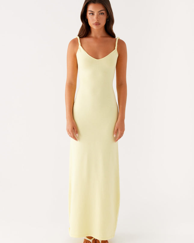 Woman wearing soft blue maxi dress