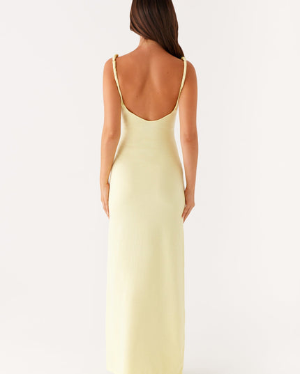 Woman wearing soft blue maxi dress