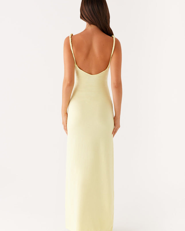 Woman wearing soft blue maxi dress