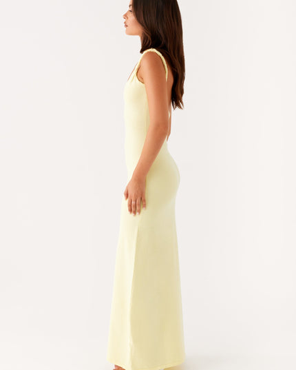 Woman wearing soft blue maxi dress