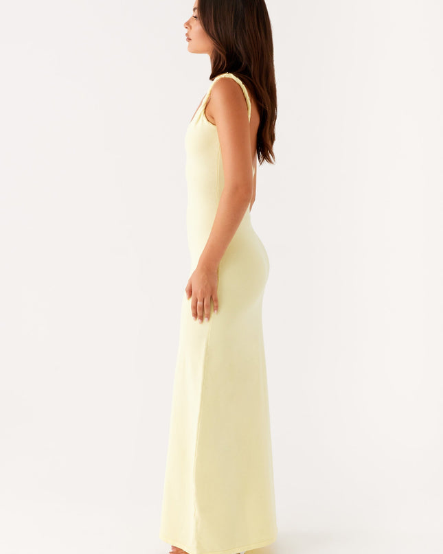 Woman wearing soft blue maxi dress