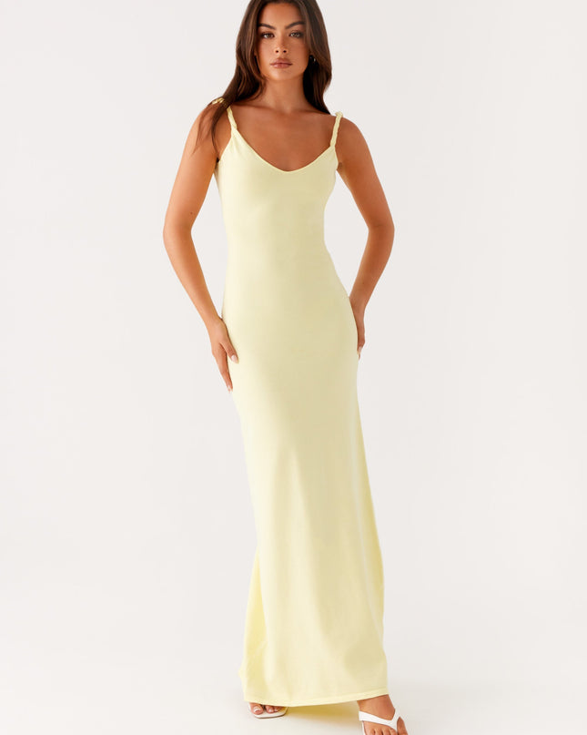 Woman wearing soft blue maxi dress